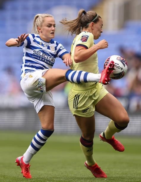 Katie McCabe of Arsenal in action with Faye Bryson of Reading during the Barclays FA Women's Super League match between Reading Women and Arsenal...