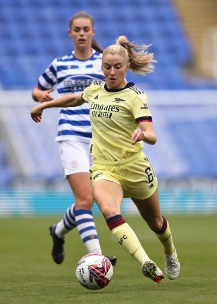 Leah Williamson of Arsenal in action with Emma Harries of Reading during the Barclays FA Women's Super League match between Reading Women and Arsenal...
