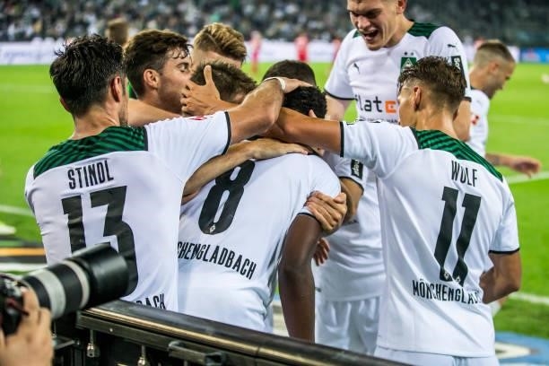 The Team of Borussia Moenchengladbach celebrate the team's third goal during the Bundesliga match between Borussia Moenchengladbach and Arminia...