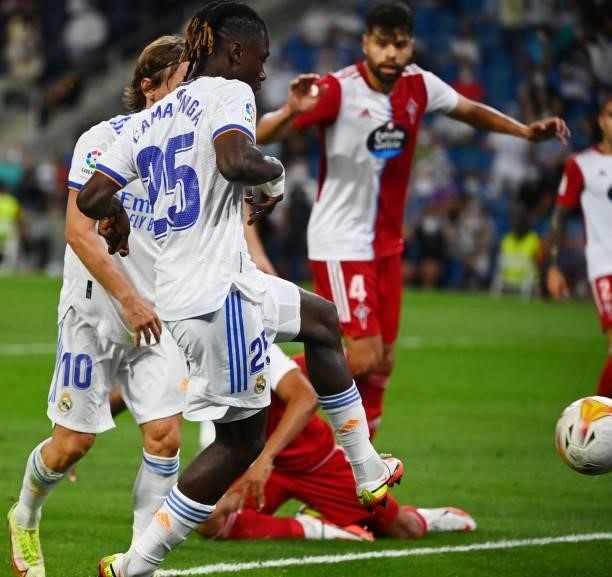 Real Madrid's French midfielder Eduardo Camavinga scores his team's fourth goal during the Spanish League football match between Real Madrid CF and...