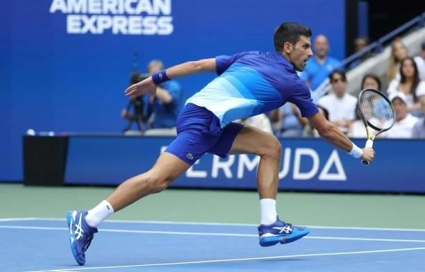 Novak Djokovic of Serbia returns the ball against Daniil Medvedev of Russia in the first set of the Men's Singles final match at the USTA Billie Jean...