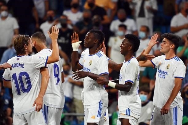 Real Madrid's French midfielder Eduardo Camavinga celebrates scoring his team's fourth goal during the Spanish League football match between Real...