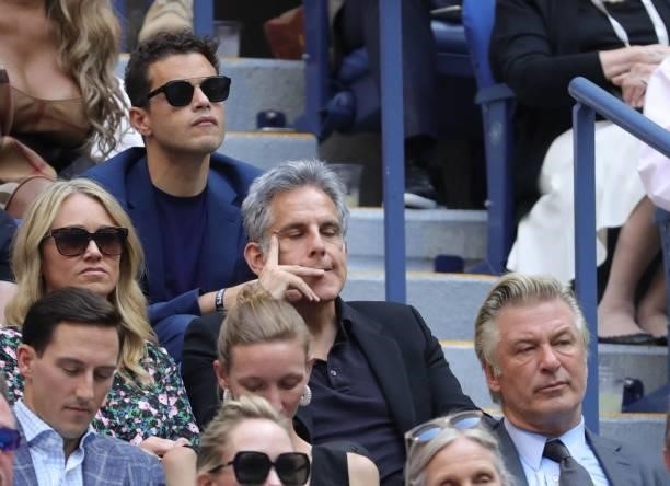 Actors Rami Malek, Ben Stiller and Alec Baldwin watch the match between Serbia's Novak Djokovic and Russia's Daniil Medvedev during their 2021 US...