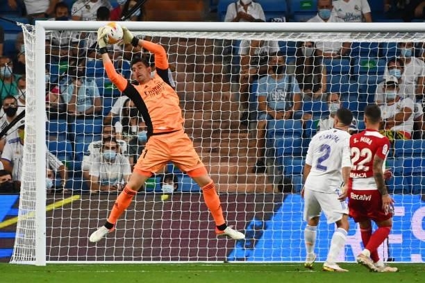 Real Madrid's Belgian goalkeeper Thibaut Courtois makes a save during the Spanish League football match between Real Madrid CF and RC Celta de Vigo...