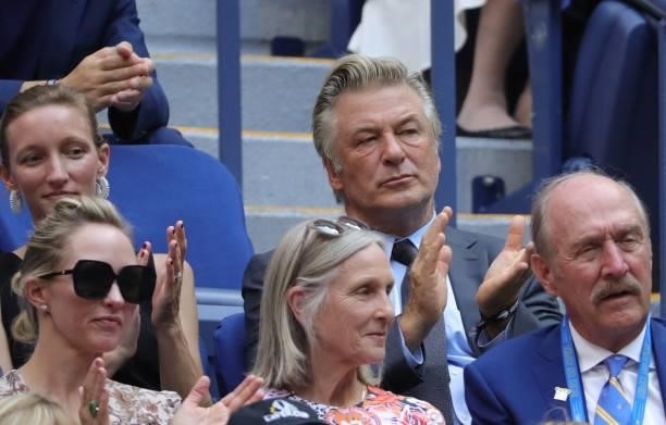 Actor Alec Baldwin claps during the match between Serbia's Novak Djokovic and Russia's Daniil Medvedev during their 2021 US Open Tennis tournament...