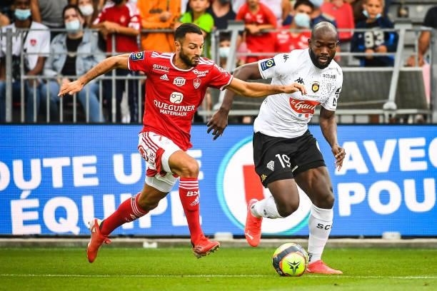 Haris BELKEBLA of Brest and Stephane BAHOKEN of Angers during the Ligue 1 Uber Eats match between Brest and Angers at Stade Francis Le Ble on...