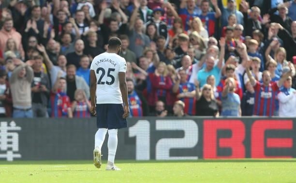 Tottenham Hotspur's Japhet Tanganga walks off after being shown a red card during the Premier League match between Crystal Palace and Tottenham...