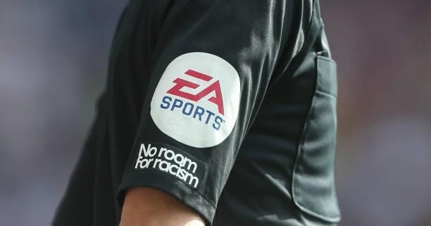 Sports logo and a No room for racism message on the assistant referees kit during the Premier League match between Crystal Palace and Tottenham...