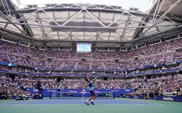Serbia's Novak Djokovic serves to Russia's Daniil Medvedev during their 2021 US Open Tennis tournament men's final match at the USTA Billie Jean King...