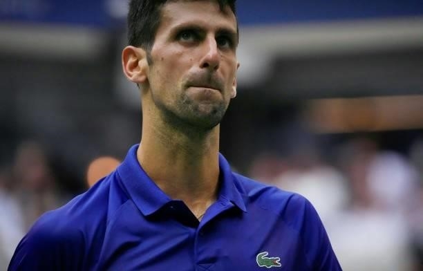 Novak Djokovic of Serbia looks on against Daniil Medvedev of Russia in the second set of the Men's Singles final match at the USTA Billie Jean King...