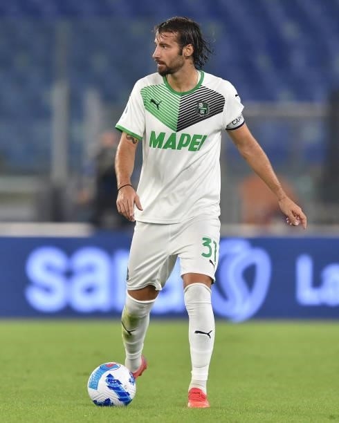 Gian Marco Ferrari of US Sassuolo in action during the Serie A match between AS Roma and US Sassuolo at Stadio Olimpico on September 12, 2021 in...
