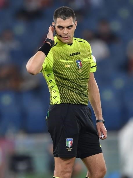 Referee Simone Sozza speaks with Rosario Abisso to the VAR during the Serie A match between AS Roma and US Sassuolo at Stadio Olimpico on September...