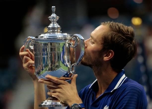 Russia's Daniil Medvedev kisses the trophy after winning the 2021 US Open Tennis tournament men's final match against Serbia's Novak Djokovic at the...