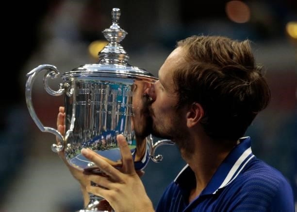 Russia's Daniil Medvedev kisses the trophy after winning the 2021 US Open Tennis tournament men's final match against Serbia's Novak Djokovic at the...