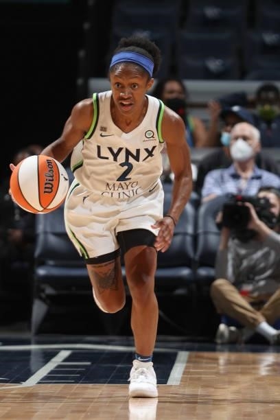 Crystal Dangerfield of the Minnesota Lynx dribbles the ball during the game against the Indiana Fever on September 12, 2021 at Target Center in...
