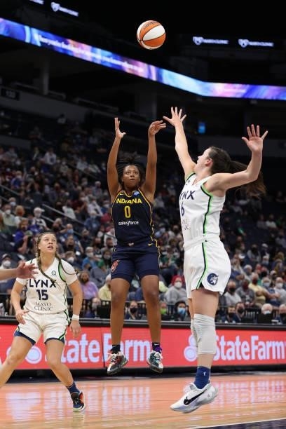 Kelsey Mitchell of the Indiana Fever shoots a three point basket drives to the basket against the Minnesota Lynx on September 12, 2021 at Target...