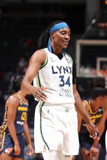 Sylvia Fowles of the Minnesota Lynx high fives teammate during the game against the Indiana Fever on September 12, 2021 at Target Center in...