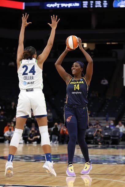 Jantel Lavender of the Indiana Fever passes the ball during the game against the Minnesota Lynx on September 12, 2021 at Target Center in...
