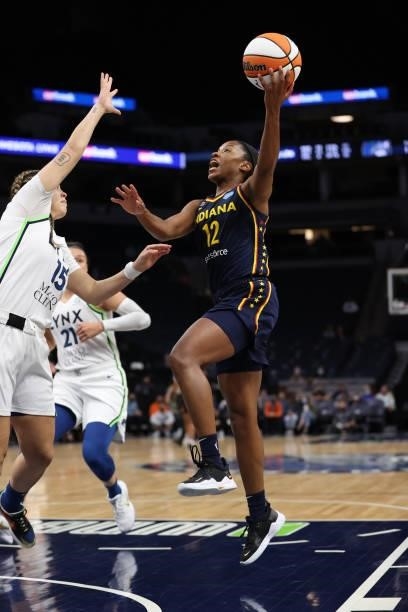 Lindsay Allen of the Indiana Fever drives to the basket during the game against the Minnesota Lynx on September 12, 2021 at Target Center in...