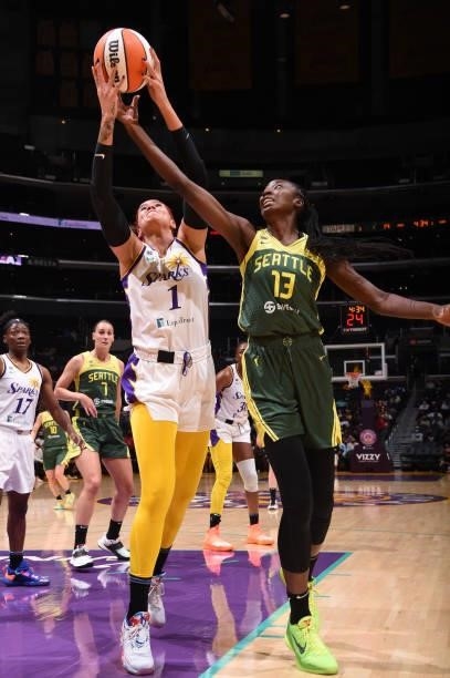 Amanda Zahui B of the Los Angeles Sparks and Ezi Magbegor of the Seattle Storm go up for the rebound during the game on September 12, 2021 at Staples...