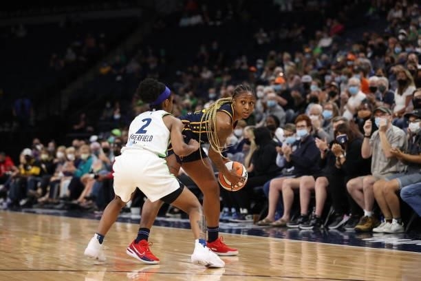 Crystal Dangerfield of the Minnesota Lynx plays defense on Tiffany Mitchell of the Indiana Fever during the game on September 12, 2021 at Target...
