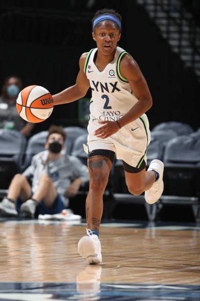 Crystal Dangerfield of the Minnesota Lynx dribbles the ball during the game against the Indiana Fever on September 12, 2021 at Target Center in...