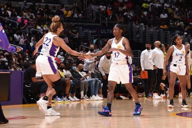 Erica Wheeler of the Los Angeles Sparks high fives her teammate during the game against the Seattle Storm on September 12, 2021 at Staples Center in...
