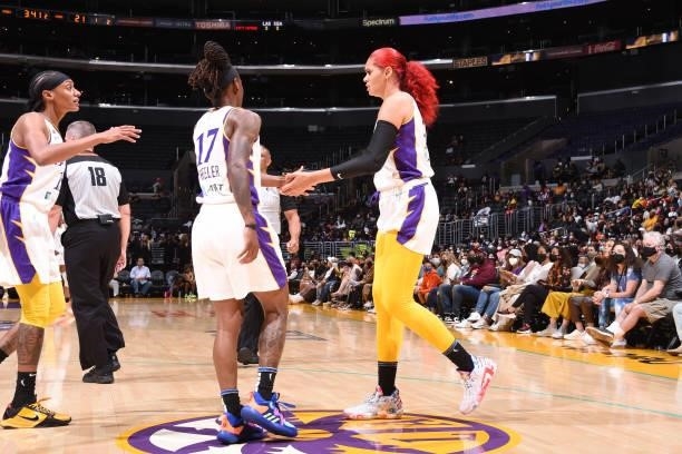 Amanda Zahui B of the Los Angeles Sparks high fives her teammates during the game against the Seattle Storm on September 12, 2021 at Staples Center...
