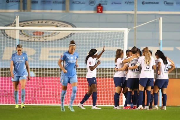 Players of Tottenham Hotspur Women celebrate as Karima Benameur Taieb of Manchester City Women scores an own goal to make it 1-2 during the Barclays...