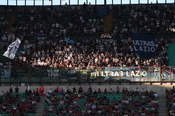 Fans of SS Lazio attend during the Serie A match between AC Milan and SS Lazio at Stadio Giuseppe Meazza on September 12, 2021 in Milan, Italy.