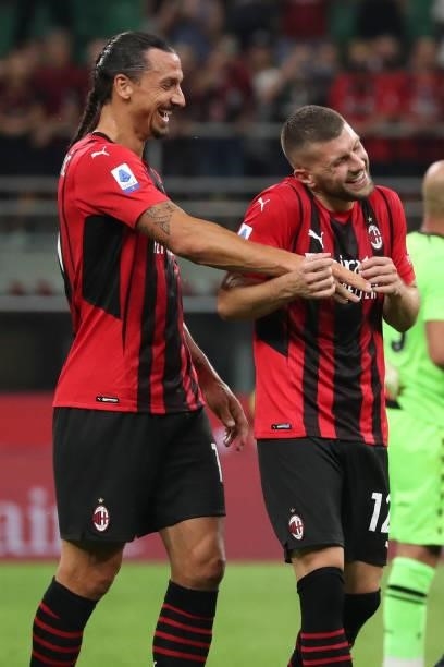 Zlatan Ibrahimovic of AC Milan and Ante Rebic talk at the end of the Serie A match between AC Milan and SS Lazio at Stadio Giuseppe Meazza on...