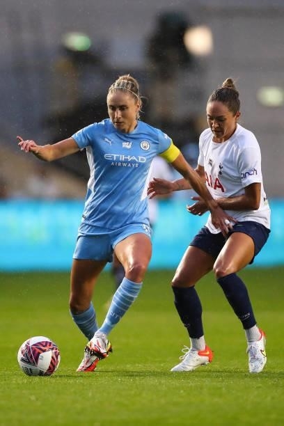 Steph Houghton of Manchester City Women and Kyah Simon of Tottenham Hotspur Women during the Barclays FA Women's Super League match between...