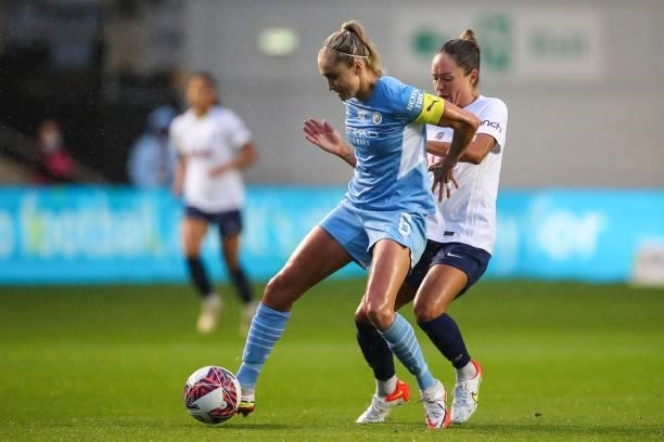 Steph Houghton of Manchester City Women and Kyah Simon of Tottenham Hotspur Women during the Barclays FA Women's Super League match between...