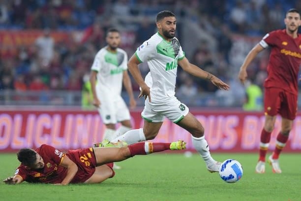 Gregoire Defrel of Sassuolo Calcio and Stephan El Shaarawy of AS Roma compete for the ball during the Serie A match between AS Roma and Sassuolo...