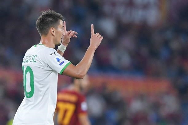 Filip Djuricic of Sassuolo Calcio celebrates after scoring first goal during the Serie A match between AS Roma and Sassuolo Calcio at Stadio...
