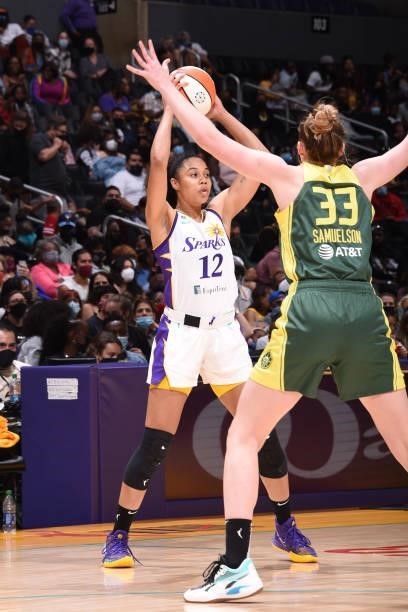 Nia Coffey of the Los Angeles Sparks looks to pass the ball against the Seattle Storm on September 12, 2021 at Staples Center in Los Angeles,...