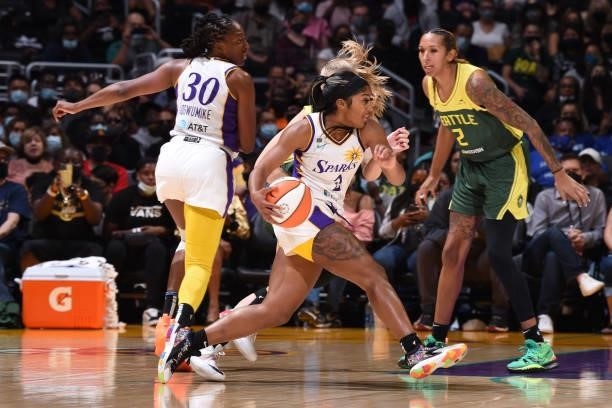 Te'a Cooper of the Los Angeles Sparks drives to the basket against the Seattle Storm on September 12, 2021 at Staples Center in Los Angeles,...