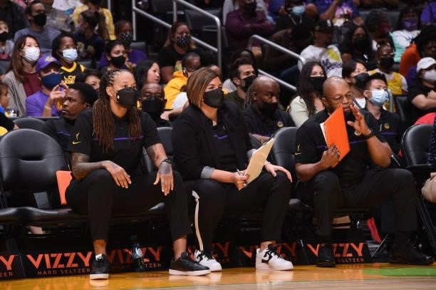 Assistant Coaches, Seimone Augustus, Latricia Trammell and Fred Williams of the Los Angeles Sparks look on during the game against the Seattle Storm...