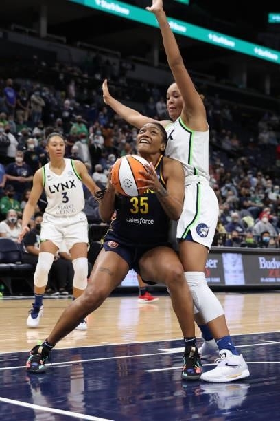 Victoria Vivians of the Indiana Fever drives to the basket during the game against the Minnesota Lynx on September 12, 2021 at Target Center in...