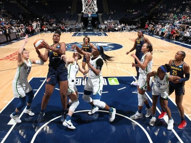 Teaira McCowan of the Indiana Fever handles the ball during the game against the Minnesota Lynx on September 12, 2021 at Target Center in...