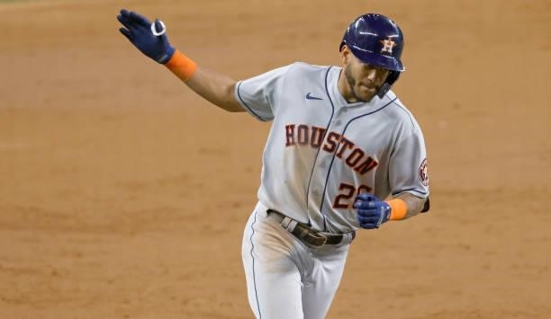 Jose Siri of the Houston Astros rounds the bases on his two-run home run against the Texas Rangers in the third inning at Globe Life Field on...