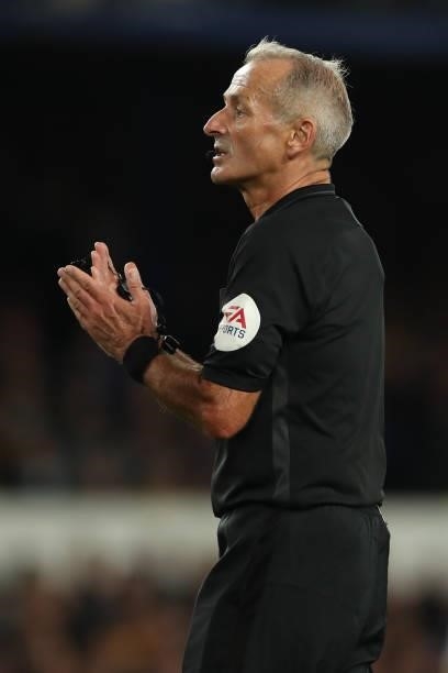 Referee Martin Atkinson during the Premier League match between Everton and Burnley at Goodison Park on September 13, 2021 in Liverpool, England.