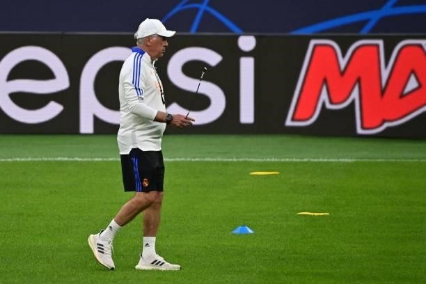 Real Madrid's Italian coach Carlo Ancelotti takes part in a training session at the San Siro stadium, in Milan, on September 14 on the eve of the...