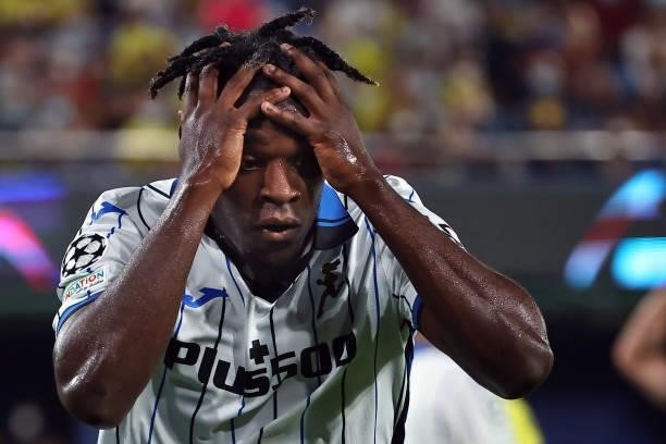 Atalanta's Colombian forward Duvan Zapata reacts to missing a goal opportunity during the UEFA Champions League first round group F football match...
