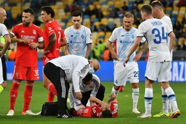 Benfica's Portuguese midfielder Rafa Silva reacts in pain during the UEFA Champions League football match between FC Dynamo Kiev and SL Benfica at...