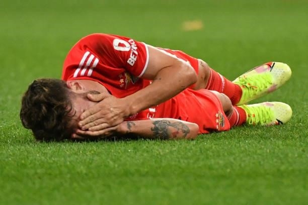 Benfica's Portuguese midfielder Rafa Silva reacts in pain during the UEFA Champions League football match between FC Dynamo Kiev and SL Benfica at...