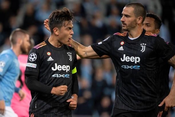 Paulo Dybala and Leonardo Bonucci of Juventus celebrate after the 0-2 goal during the UEFA Champions League group H match between Malmo FF and...