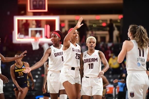 Atlanta Dream players celebrate after the game against the Indiana Fever on September 14, 2021 at Gateway Center Arena in College Park, Georgia. NOTE...