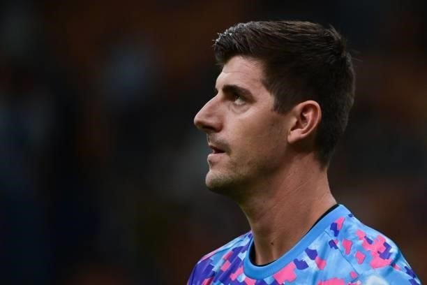 Real Madrid's Belgian goalkeeper Thibaut Courtois looks on as he warms up prior to the UEFA Champions League Group D football match between Inter...