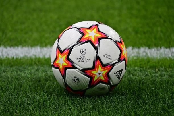 An official competition match ball is pictured on the pitch prior to the UEFA Champions League Group D football match between Inter Milan and Real...